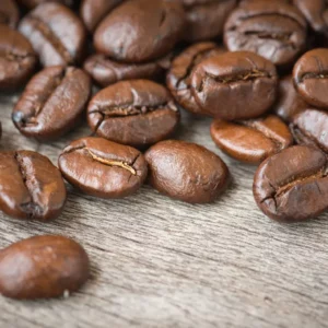 A close up of coffee beans on the ground