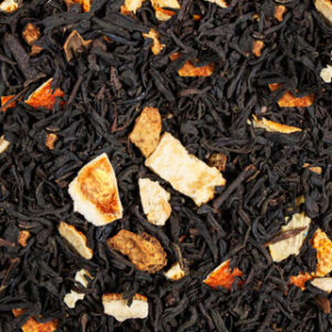 A close up of tea leaves with orange slices