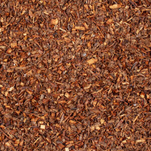 A close up image of a brown Earl Grey Rooibos Herbal Tea.
